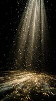 Golden Particles Dance in Light Beams Creating a Magical Atmosphere in a Dark Space photo