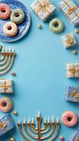 Festive Donuts and Gifts Arranged Around a Menorah on a Blue Background During a Holiday Celebration photo