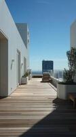 Stunning Rooftop Terrace With Panoramic City Views Under Bright Blue Sky photo