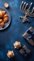 Delightful Celebration With Croissants, Gifts, and a Menorah on a Blue Background photo