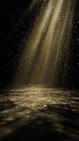 Golden Particles Dance in Light Beams Creating a Magical Atmosphere in a Dark Space. photo