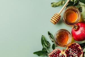 Honey and Pomegranate Display on Soft Green Background for Healthy Living and Culinary Inspiration photo