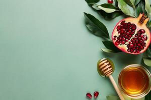 Honey and Pomegranate Display on Soft Green Background for Healthy Living and Culinary Inspiration. photo
