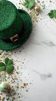 Festive Green Hat With Decorations and Clovers for Celebration on a Marble Background photo