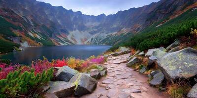 Autumnal Mountain Lake Scene with Stone Path photo