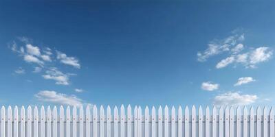 White Picket Fence Against Blue Sky with Clouds Summer Day Scene photo