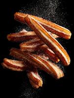 A Cascade Of Churros With Sweet Cinnamon Sugar photo