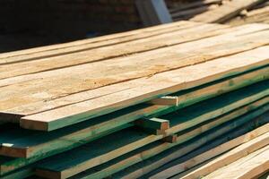 Many flat boards. The board is used in construction. Wooden material. Construction concept photo