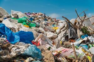 Pile of domestic garbage in landfill. Plastic scrap in landfill. Open dumping photo