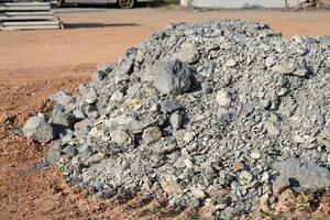 Construction activity gravel pile construction site urban environment ground level industry impact photo