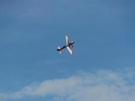 Stunt plane flying clear sky aerial photography outdoor bird's eye view adventure photo