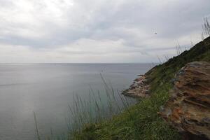 Coastal serenity ocean view shoreline landscape photography natural setting wide angle tranquility photo