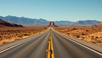 a desert highway stretching far into the distances photo