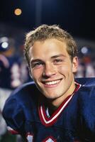 Young Football Player Smiles Confidently on the Field During a Night Game in an Athletic Environment photo