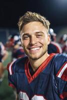 Smiling Young Football Player Celebrating a Game Night Victory With Team Spirit. photo