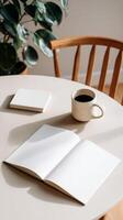 Coffee and an Open Notebook on a Wooden Table in a Bright Space During Morning Hours photo