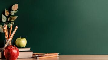 Classroom Supplies With Apple and Pencils on Wooden Table Against Green Backdrop in Bright Sunlight. photo