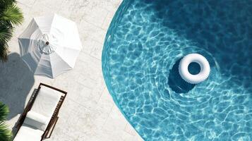 Relaxing Summer Day by the Sparkling Pool With a Floating Ring and Lounge Chair photo