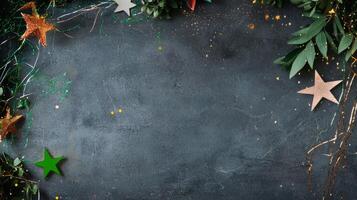 Dark Textured Surface With Decorative Stones and Golden Stars Creating a Festive Look. photo