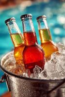 Refreshing Drinks in Ice Bucket at a Sunny Poolside Gathering During Summer Afternoon photo
