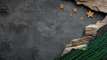 Decorative Wall Design Featuring Textured Stones and Golden Stars Against a Dark Background photo