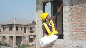 Portrait of engineers inspect and assess the residential home construction site's progress,242 photo