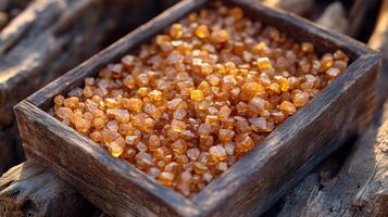 Amber crystals in wooden box photo
