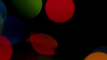 Multicolored light leaks 4k footage on black background. Lens studio flare leak burst overlays. Natural lighting lamp rays bokeh effect. For compositing over your footage, stylizing , transitions video