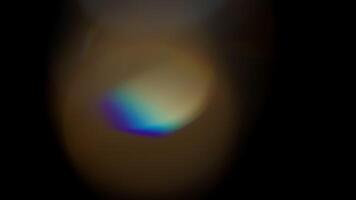 Multicolored light leaks 4k footage on black background. Lens studio flare leak burst overlays. Natural lighting lamp rays bokeh effect. For compositing over your footage, stylizing , transitions video
