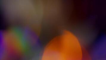 Multicolored light leaks 4k footage on black background. Lens studio flare leak burst overlays. Natural lighting lamp rays bokeh effect. For compositing over your footage, stylizing , transitions video