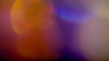 Multicolored light leaks 4k footage on black background. Lens studio flare leak burst overlays. Natural lighting lamp rays bokeh effect. For compositing over your footage, stylizing , transitions video
