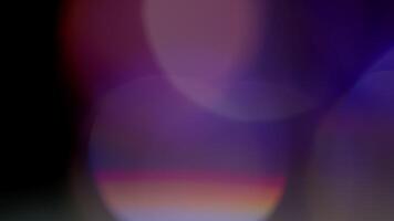 Multicolored light leaks 4k footage on black background. Lens studio flare leak burst overlays. Natural lighting lamp rays bokeh effect. For compositing over your footage, stylizing , transitions video