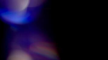 Multicolored light leaks 4k footage on black background. Lens studio flare leak burst overlays. Natural lighting lamp rays bokeh effect. For compositing over your footage, stylizing , transitions video