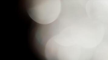 Light Leaks abstract 4K footage. Moving blinking circle lens glow flare bokeh overlays natural animation defocused blurred color background. Compositing over your footage, stylizing , transitions video