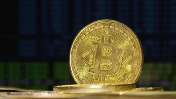 Bitcoin BTC coin and Ethereum ETH coins are rotating on bills cash of 100 dollars. Digital coin cyberspace and cryptocurrency. Mining virtual money. Stock exchange market trading, online payment video