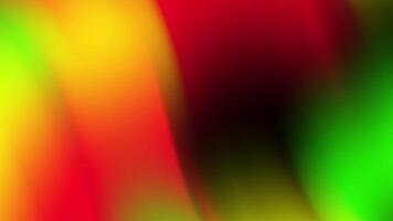 A vibrant and energetic abstract background blending red, yellow, green, and black in smooth gradients. This design symbolizes the celebration of Juneteenth with bright, hopeful tones video