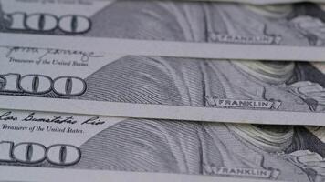 Cash money banknotes. Macro 100 american dollar bills counting. Franklin's face texture. Finance, investment concept. Close-up shot. Currency exchange of one hundred USD. Rich business economy of USA video