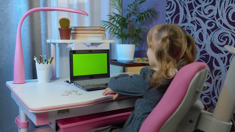 Child girl studying homework on laptop webcam online lesson at home. Chroma key pc green screen. E-learning, webinar. Online distance education for children kids during coronavirus lockdown quarantine 67263376 Stock Video at Vecteezy