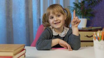 Child girl doing school homework teach mathematic and counting with teacher at home. Online e-learning, children pupil distance education lesson, technology for kids. call by webcam on internet video