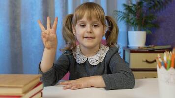 Online e-learning, children pupil distance education lesson, technology for kids. Child girl doing school homework teach mathematic and counting with teacher at home. call by webcam on internet video