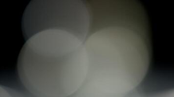 Light Leaks abstract 4K footage. Moving blinking circle lens glow flare bokeh overlays natural animation defocused blurred color background. Compositing over your footage, stylizing , transitions video
