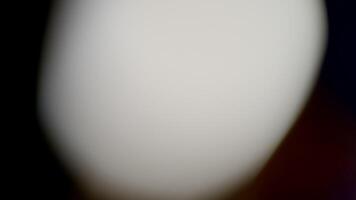 luz vazamentos abstrato 4k imagens de vídeo. comovente piscando círculo lente brilho flare bokeh sobreposições, animação desfocado borrado cor fundo. composição sobre seu imagens de vídeo, estilizando , transições video