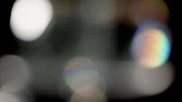 Multicolored light leaks 4k footage on black background. Lens studio flare leak burst overlays. Natural lighting lamp rays bokeh effect. For compositing over your footage, stylizing , transitions video