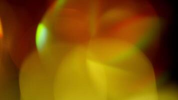 Multicolored light leaks 4k footage on black background. Lens studio flare leak burst overlays. Natural lighting lamp rays bokeh effect. For compositing over your footage, stylizing , transitions video