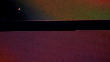 Glitch loop footage with abstract VHS noise and analog grain textures perfect for use as motion backgrounds or cinematic intro transitions in retro edits video