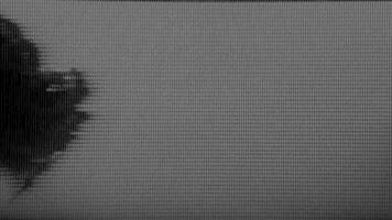 VHS style glitch background with film grain texture and digital noise captured from distorted retro footage. video