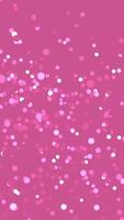 Pink bokeh lights float on a solid pink background. video