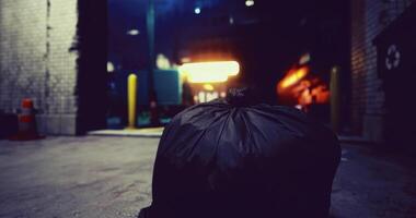 CGI Urban setting with a black garbage bag near a dimly lit alleyway at night video