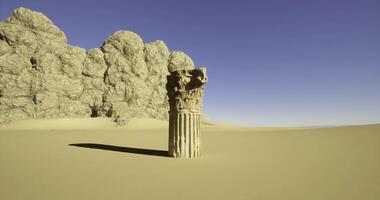 CGI Ancient column stands alone in a vast desert landscape under clear sky video
