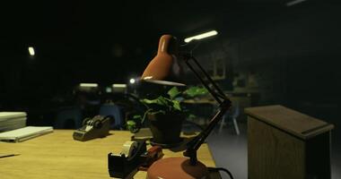 CGI Desk with lamp and plant in a dimly lit classroom during the evening video